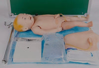 Modelo de venopunción cefalica y unbilical infantil nino