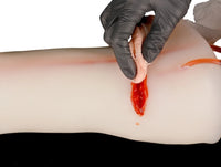 Modelo de brazo para entrenamiento de heridas trauma sangrado emergencia