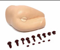 Simulador de examinacion rectal con heces
